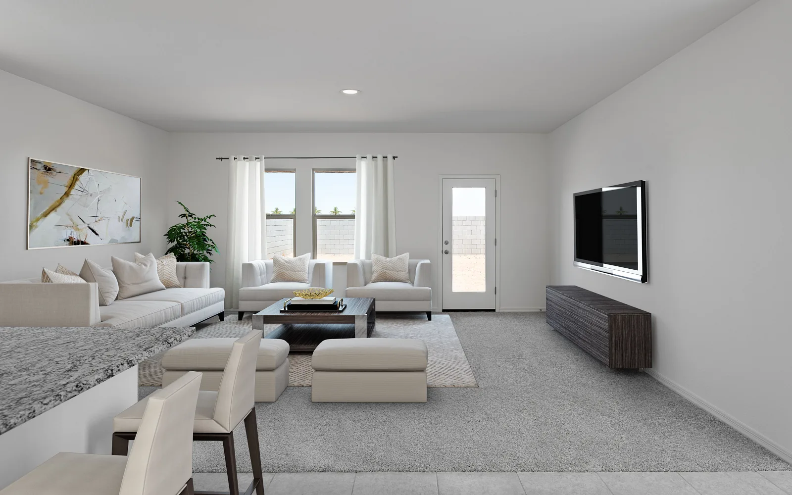 Sala familiar iluminada en una casa nueva de Starlight Homes